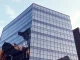 Modern corporate office building representing the business headquarters of GameStop and eBay amid a takeover bid.