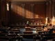 US Senate chamber interior during a legislative session with a senator at the podium