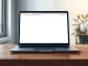 Google's Gemini AI assistant integrated into the Chrome browser on a laptop, representing the new feature expansion.