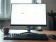 A clean, minimalist search engine homepage displayed on a monitor, symbolizing alternatives to Google's AI-driven search.