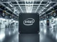 Intel wafer in a semiconductor cleanroom with engineers in background