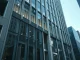 Exterior of a modern financial office building representing institutional crypto banking regulation