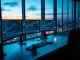 Professional trading desk with Kraken Pro interface showing margin trading charts