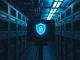 A glowing digital shield icon on a monitor in a dimly lit server room, representing cybersecurity.