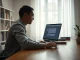Person using ChatGPT on a laptop in a calm home office setting