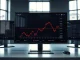 Trading desk monitors showing declining Bitcoin price chart and cryptocurrency market data in a professional office setting
