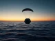 NASA Orion spacecraft splashdown in the Pacific Ocean marking the end of the Artemis II mission.