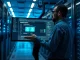 IT administrator managing containerized OpenClaw agents on a monitor in a server room