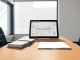 Corporate stablecoin adoption showing digital payment interface on treasurer's desk representing blockchain business integration