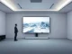 Runway CEO Cristóbal Valenzuela discussing world models in a minimalist tech studio