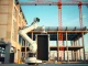 Autonomous robotic arm assembling server racks at a US data center construction site