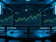 Trading desk monitors showing Solana SOL price charts with bullish breakout pattern