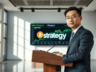 Strategy CEO Phong Le speaking at a press conference with Bitcoin charts in background