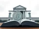 Bank of Italy building with a digital euro coin symbolizing tokenized SEPA payments