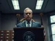 Treasury Secretary Scott Bessent at a podium discussing seizure of Iranian crypto assets