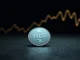 Worldcoin WLD token sale by Sam Altman's foundation as cryptocurrency value declines.