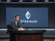 Bankless host Ryan Sean Adams in a news studio discussing Ethereum's value