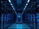 A glowing server rack in a dimly lit data center, representing AI inference processing infrastructure.