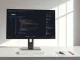 Figma interface on a monitor showing code layers, design elements, and AI features in a bright modern workspace