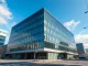 Modern corporate office building in Okayama, Japan, representing institutional crypto adoption