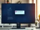 Notion interface on a monitor in a modern office workspace