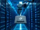 A robotic arm installing a custom AI chip in a data center server rack, representing the trend of tech companies developing their own silicon.