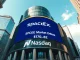 Nasdaq MarketSite display showing SpaceX stock price and logo on IPO day.