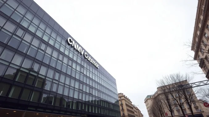 Exterior of the Spanish CNMV headquarters in Madrid, a modern glass building under overcast skies.