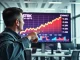 Analyst pointing at Starknet STRK price chart approaching $1 target in modern trading office