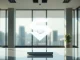 Sui blockchain logo on a modern desk with natural lighting
