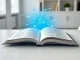 Open book and digital tablet with glowing AI neural network pattern in a bright modern office