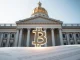 New Hampshire State House with a Bitcoin symbol representing digital asset bonds.