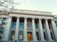 Exterior of the SEC headquarters building in Washington, D.C. on a sunny day