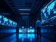 Security analyst monitoring bot detection software in a modern data center control room