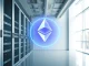 Ethereum logo glowing in a modern data center, representing the next network upgrade.