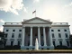 White House building in Washington D.C. on a clear day, representing political news