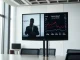 Newsroom monitor showing teleprompter silhouette and Kalshi prediction market interface