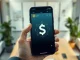 Smartphone displaying a crypto wallet interface with USDU stablecoin and US dollar symbol