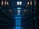 Rows of GPU server racks in a modern data center with blue LED lighting