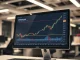 Ethereum price chart on a monitor in a financial office, illustrating market analysis