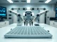 Vivodyne's robotic HIVE lab system handling tissue culture plates in a modern biotech facility.
