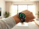 Person wearing an Apple Watch with a health metrics display, illustrating the new Health app features