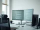 Developer workspace with code on monitors representing AI coding assistant market growth