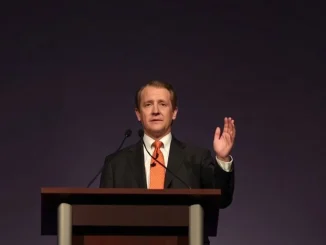 Michael Saylor speaking at a podium after the Senate blocked the CLARITY Act