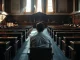 Empty US Senate chamber chamber with staffer reviewing the CLARITY Act after the failed cloture vote.